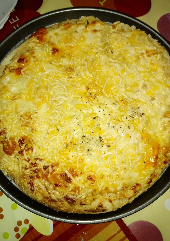 Una foto de Pizza de queso a las finas hierbas