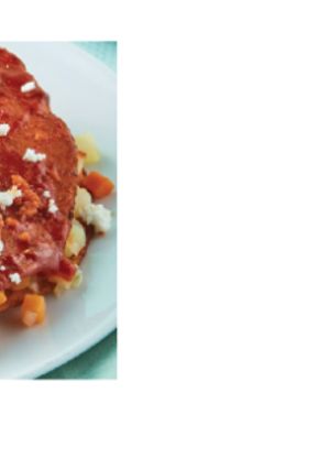 Una foto de Enjitomatadas rojas rellenas de verdura