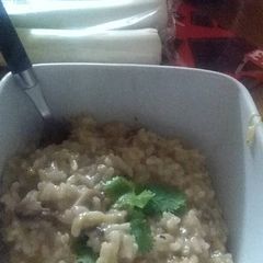 A picture of Delicious risotto with leek and mushrooms :).