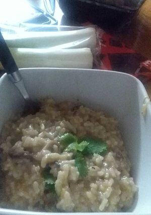 A picture of Delicious risotto with leek and mushrooms :).