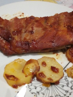 Una foto de Costillar con salsa casera