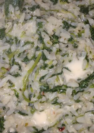 Una foto de Arroz con espinaca y queso light