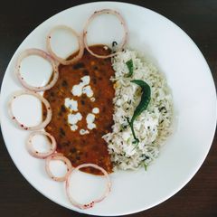 A picture of Dal makhni with jeera rice.