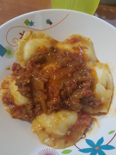 Una foto de Agnolotis de ricota