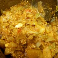 A picture of Cabbage aloo, egg,.