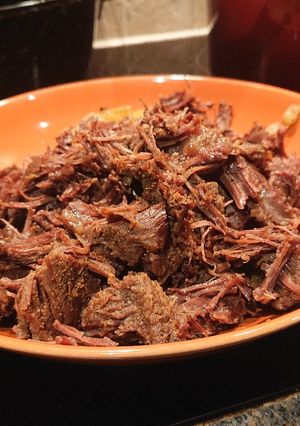 A picture of Barbacoa (Slow-cooked ox cheeks).