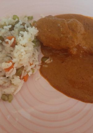 Una foto de Pollo en pipian rojo