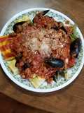 Spinach Fettuccine with Lobster Ravioli, Mussels, & Meat Sauce
