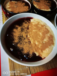Una foto de Un delicioso clásico - Mazamorra morada con arroz con Leche