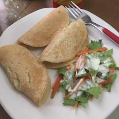 A picture of Pancake with coleslaw.