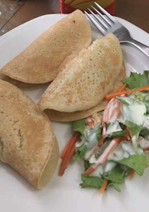 A picture of Pancake with coleslaw.