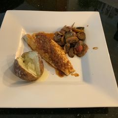 A picture of Bronzino with Spicy Orange Sauce.