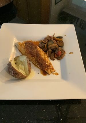 A picture of Bronzino with Spicy Orange Sauce.