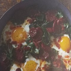 A picture of Kale with Chorizo and Eggs.