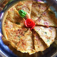 A picture of Sooji Veggie Pancake.