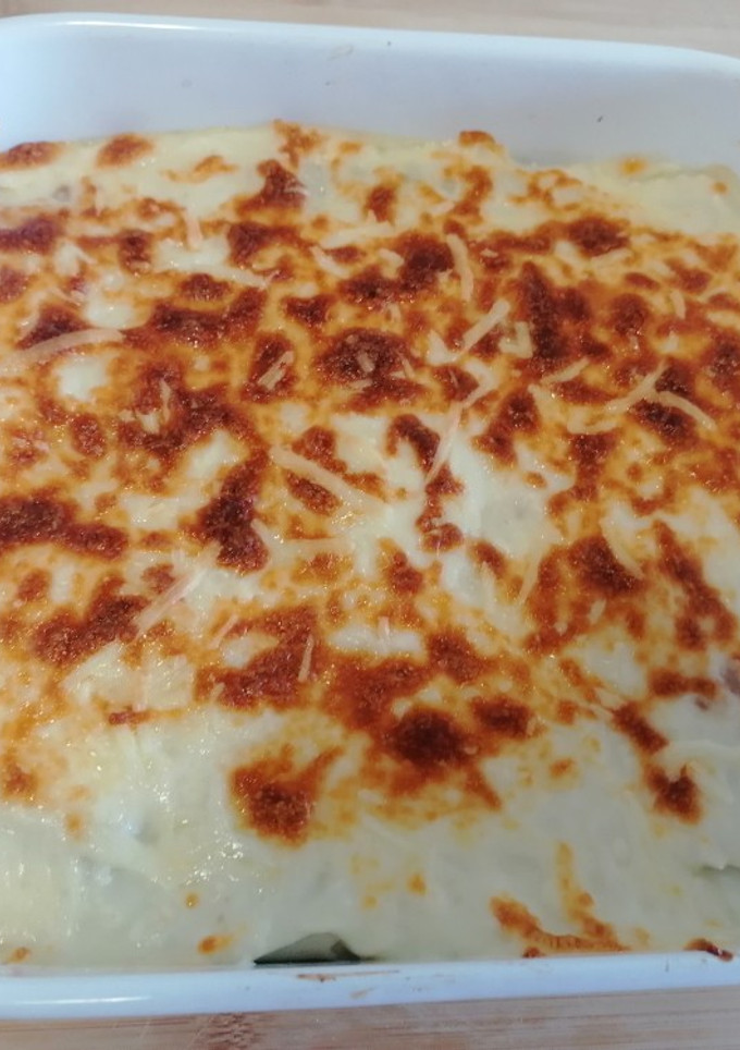 Una foto de 274. Canelones de espinacas y setas / Horno