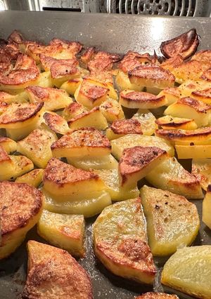 Una foto de Patatas al horno con vino blanco
