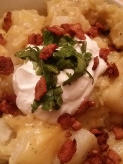 A picture of Cheesy Baked Potatoes.