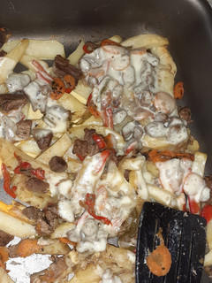 Una foto de Papas al horno con salteado