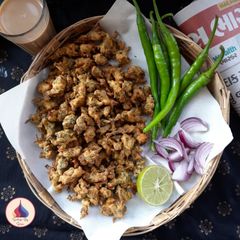 A picture of Kumbhaniya Bhajiya.