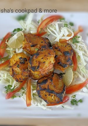 A picture of Tandoori baby potatoes with corn flour masala.