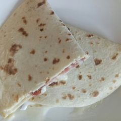A picture of Piadina Zola e speck.