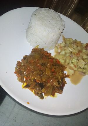 A picture of Rice,dry fish,local cucumber.