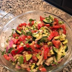 Tomato, cucumber, avocado salad A picture of Tomato, cucumber, avocado salad.