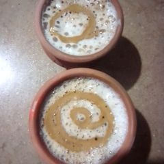 A picture of Hand beaten foamy creamy mocha coffee.