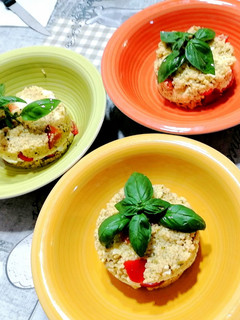A picture of Fresh Couscous with Pesto, Tomatoes, Cheese, and Eggs.