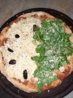 Una foto de Pizza