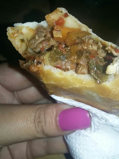 Una foto de Empanadas de carne cortada a cuchillo