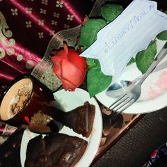 Creamy tea with brownies A picture of Creamy tea with brownies.