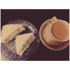 A picture of Egg Sandwich and Masala Tea (Classic breakfast from Indian Coffee House Kolkata).