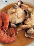 Guiso de merluza con gambas y almejas