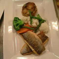 A picture of Pan fried sea bass with seasonal vegetables potote Boulanger's.