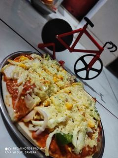 ચીઝી પીઝા (Cheesy Pizza Recipe In Gujarati) રેસીપી મુખ્ય ફોટો