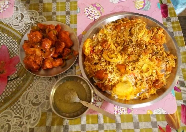 Chicken biryani With chilli chicken, and coriander chutney