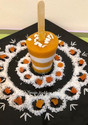 A picture of Coconut mango popsicles.