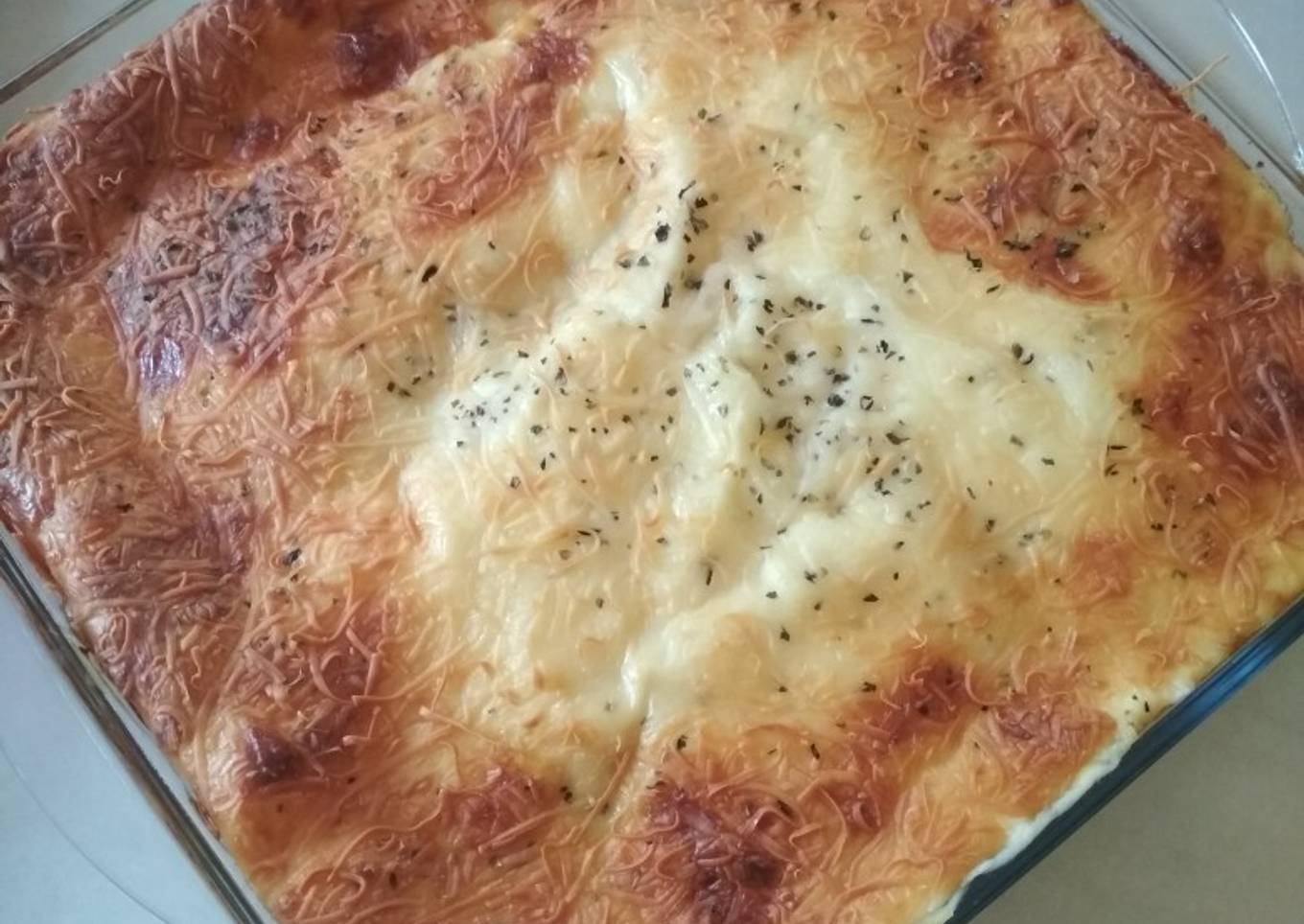 Lasaña de verduras, champiñones y gambas