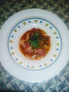 Una foto de Guisantes con jamón cocido y lomo