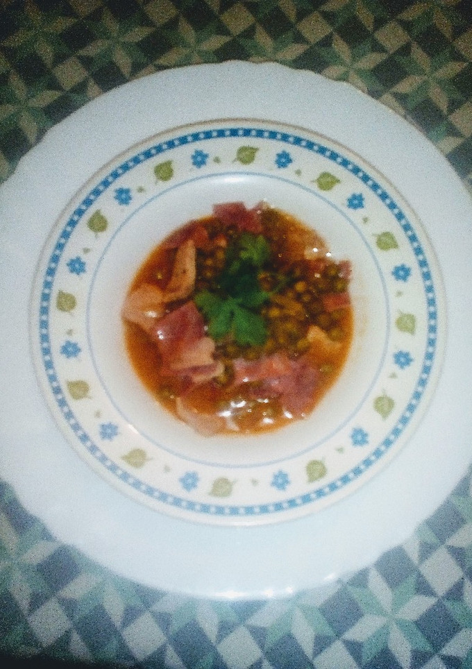 Una foto de Guisantes con jamón cocido y lomo