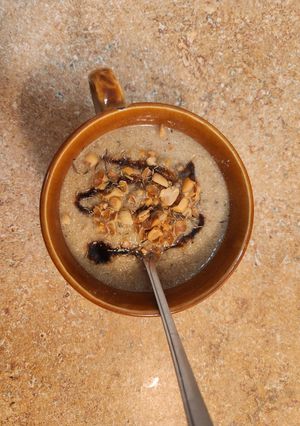 A picture of Thyme Cream of Celeriac Soup with Crushed Peanuts.