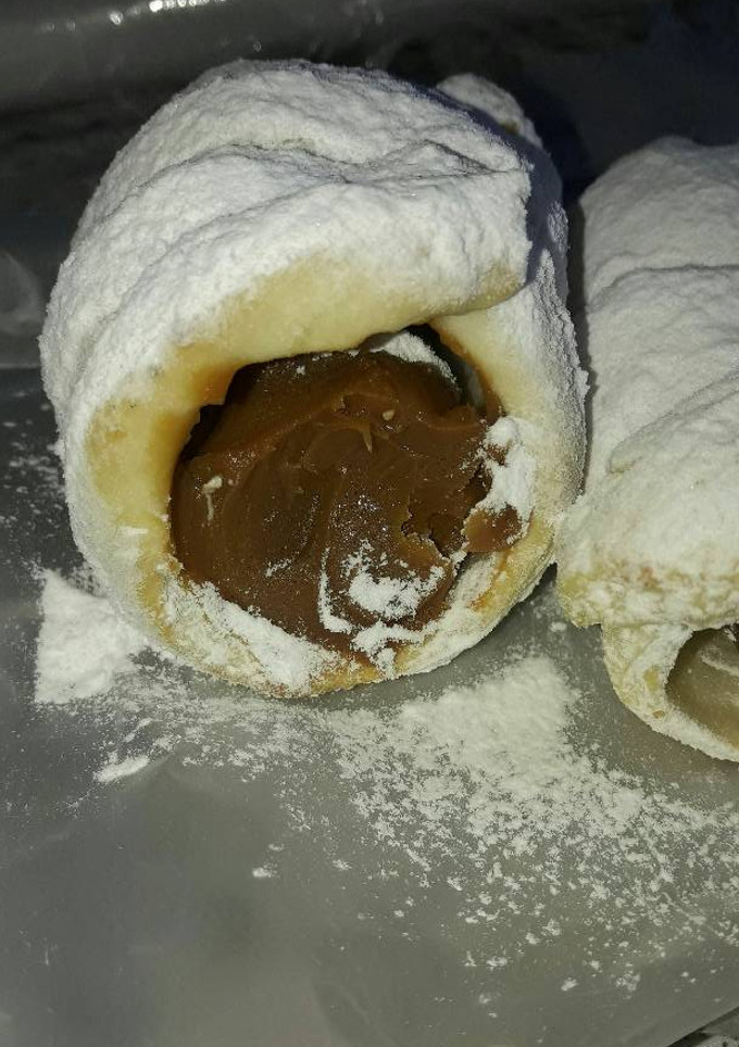 Una foto de Cañoncitos de dulce de leche