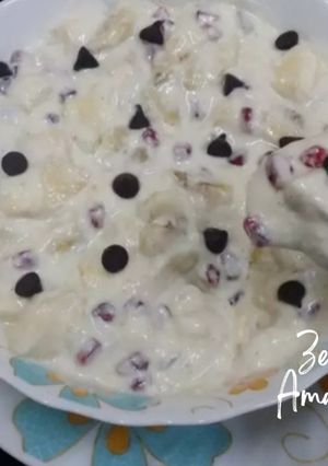 A picture of Fruits and Cream With Chocolate Chips.