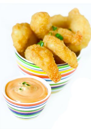 Una foto de Langostinos a la gabardina con Mojonesa