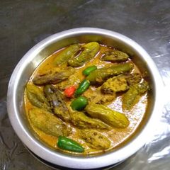 A picture of Parwal poppy seeds curry (potol posto).