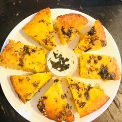 A picture of Baked Vegetable Cake /Handvo.