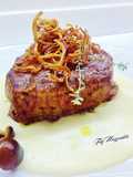 Filetto di fassona con fonduta e cipolla fritta