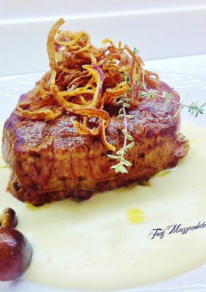 Foto di Filetto di fassona con fonduta e cipolla fritta